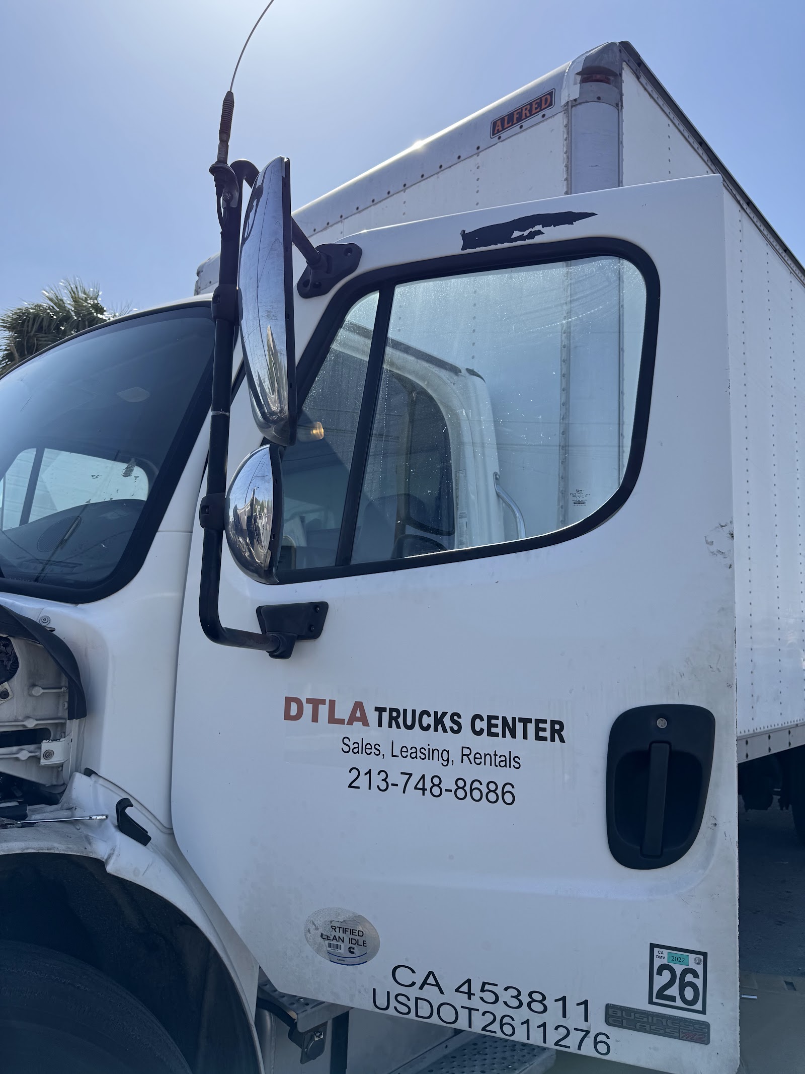 White box truck door reading DTLA Trucks Center